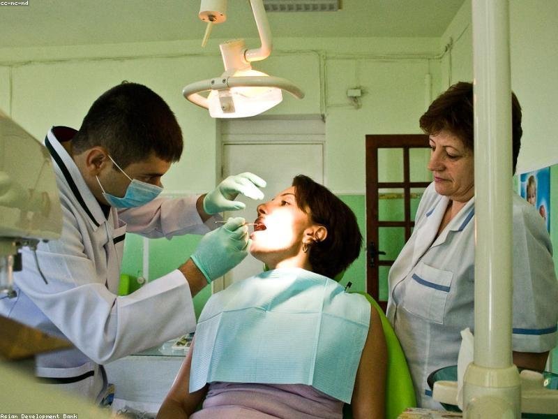Patient receiving urgent same-day dental care from clinical team
