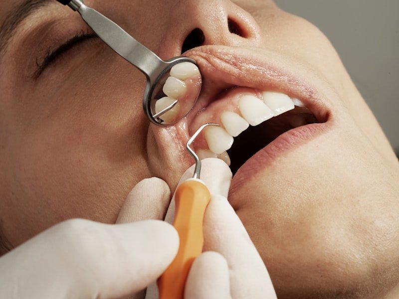 Close-up of a dental procedure showing precise implant work