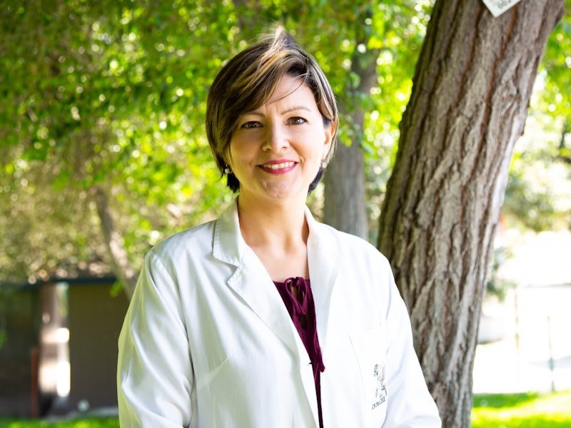 Calm warm portrait of a healthcare professional offering comfort-focused care